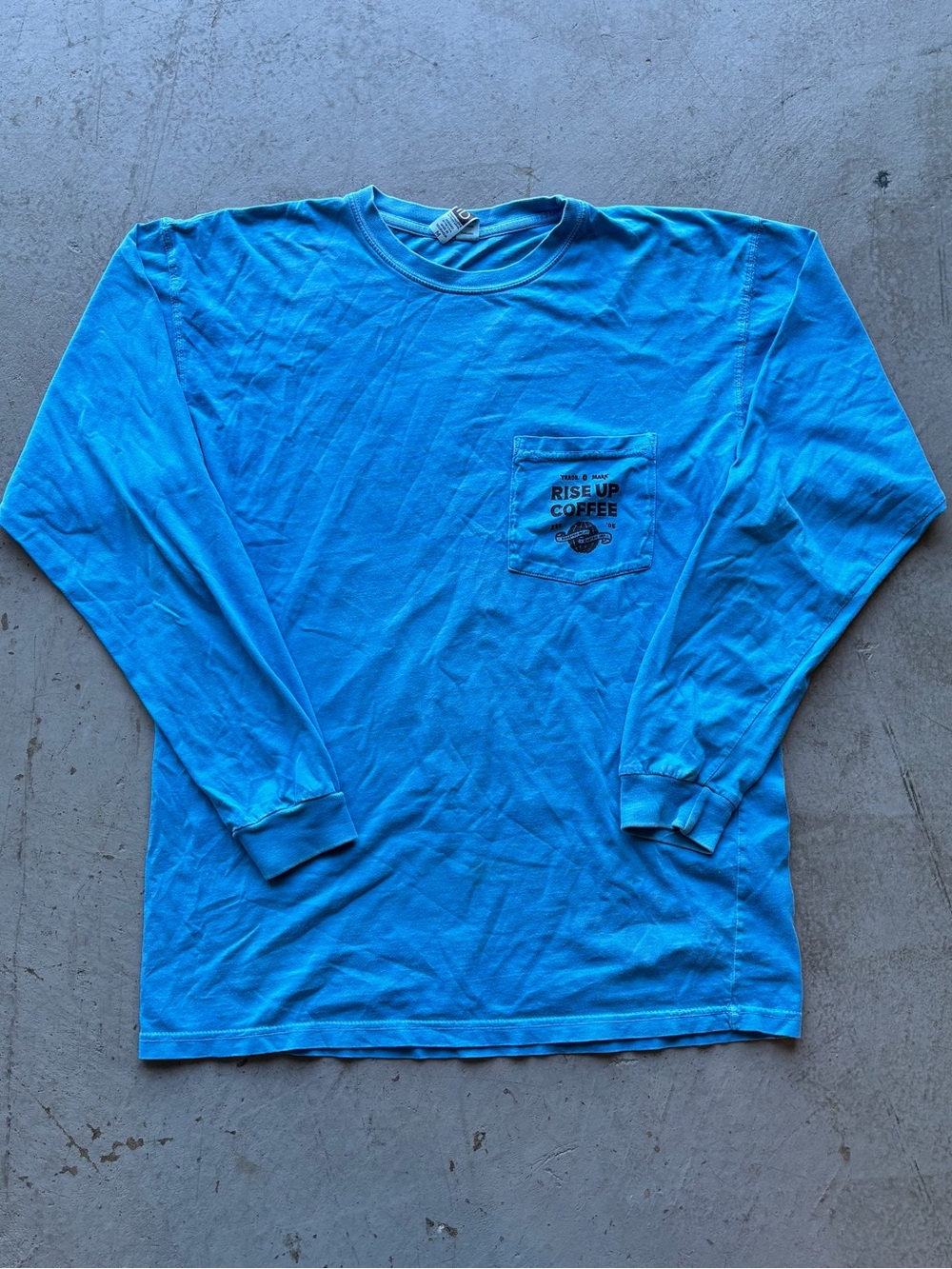 Next Level Apparel Turquoise Long Sleeve Pocket Tee with Chest Print
